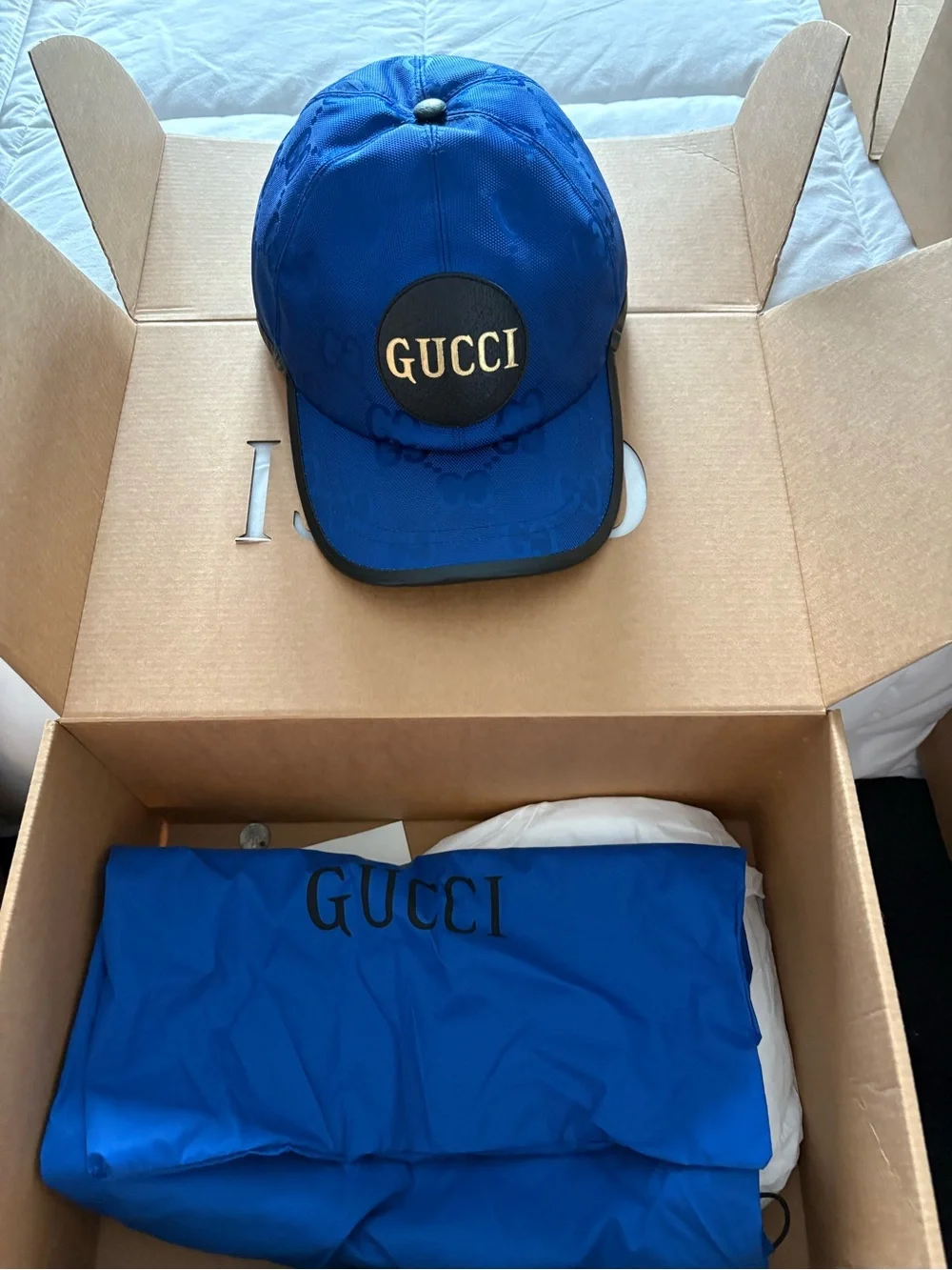 Gucci Blue Baseball Cap with Black Logo Patch